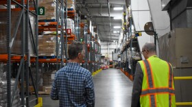 Up To Date host, Steve Kraske, takes a tour of the Harvesters warehouse with the organization's communications manager, Matt Hamer. Hamer remarked that the warehouse is more empty than usual due to a higher demand for food.