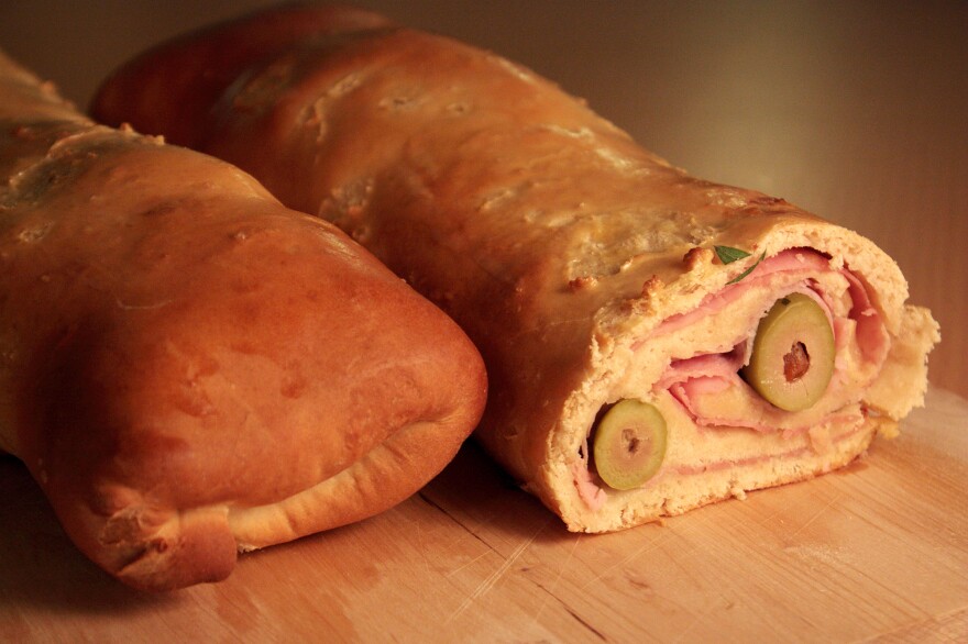<em>Pan de jamon</em> is a traditional Venezuelan Christmas bread. It's savory, not sweet, made with a mildly garlicky dough and filled with ham, bacon, green olives — and raisins.