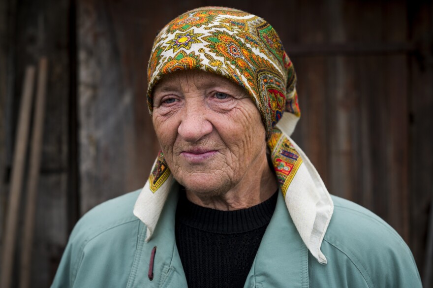 "I'm retired, and I can't do this cleanup myself," says Hanna Yurchenko, 66. "I'm just so grateful for these kids." Yurchenko's home was destroyed by a Russian strike.