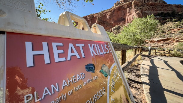A sign warns visitors of extreme heat’s health risks at Capitol Reef National Park, June 28, 2026. Capitol Reef was one of several national parks or monuments in Utah that experienced their warmest summer on record this year.