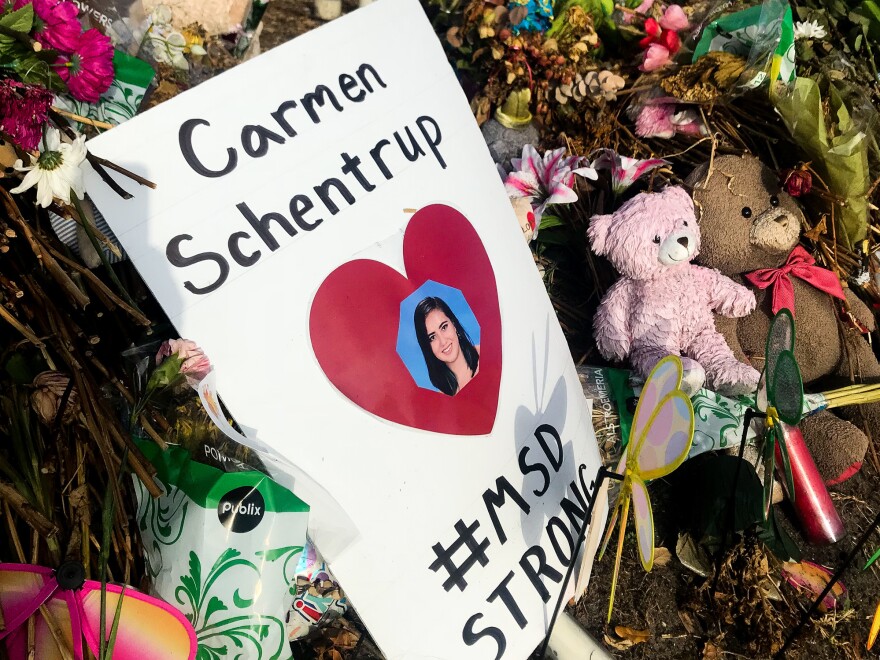 A makeshift shrine for Carmen Schentrup stands outside Marjory Stoneman Douglas High School. Hers is one of 17 shrines to the victims of the Parkland shooting.