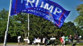 The view from Lori Arnold's lawn as a small group of people countered messages from signs on her lawn in Goshen, Indiana.