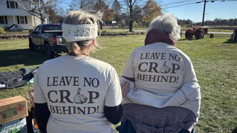 Hillsborough County Gleaners Celeste Barr and Kathy Parker show off their group t-shirts. They say the typography trips a lot of people up.