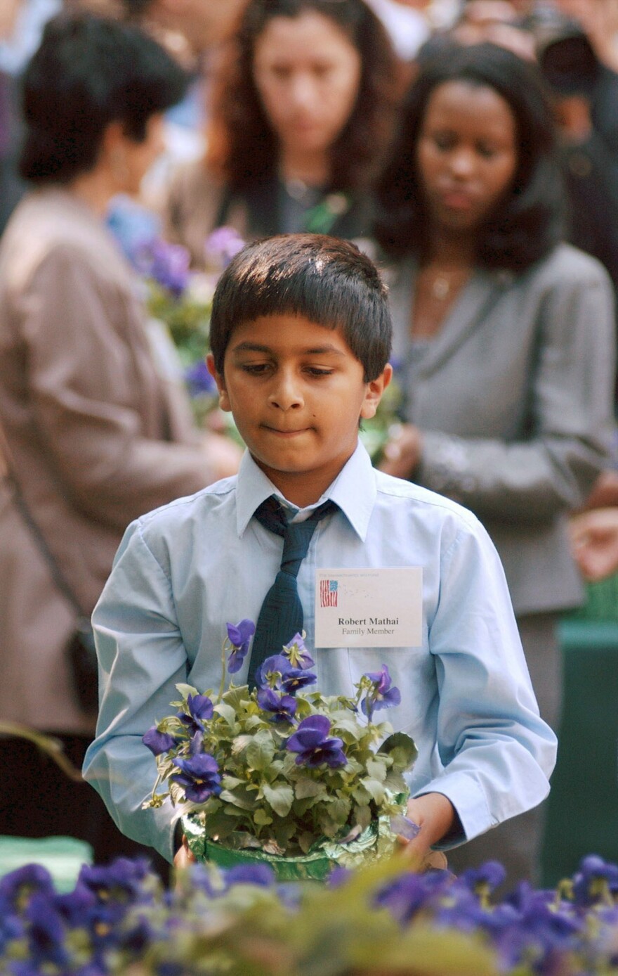 Robert Mathai was 8 when he lost his father, Joseph Mathai, a passenger on American Airlines Flight 11 when it crashed into the World Trade Center. In 2003, Robert, then 10, carried a pot of flowers to the site of a planned memorial in Boston. Mathai, who is a student at Tufts University, recently traveled to Guantanamo Bay to witness court proceedings against the alleged Sept. 11 masterminds.