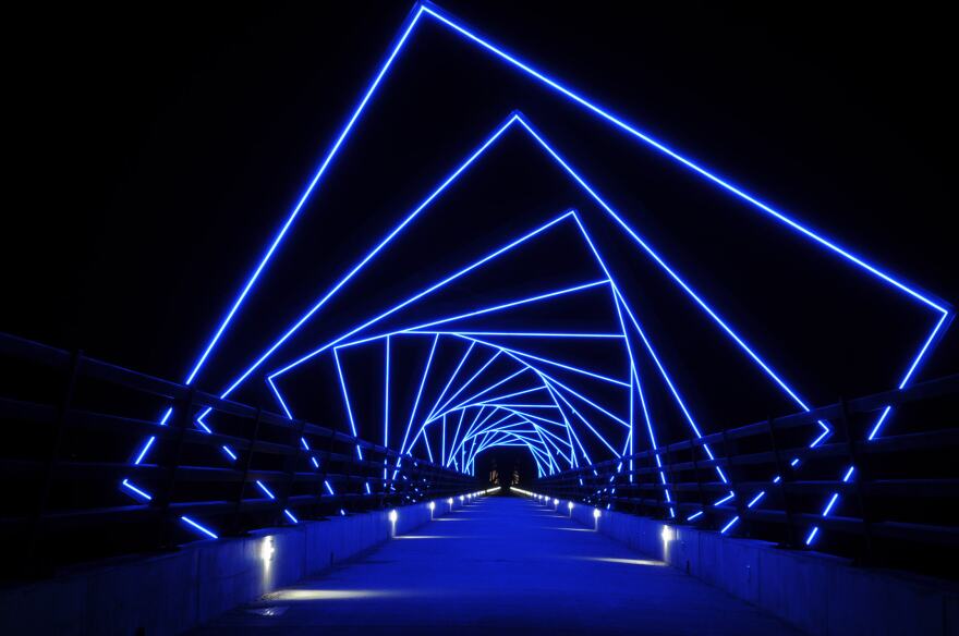 The High Trestle Trail Bridge is aglow from sunset to midnight during April through October.