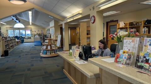 On April 13, 2026, inside the Fern Ridge Library, the children's section is to the left.
