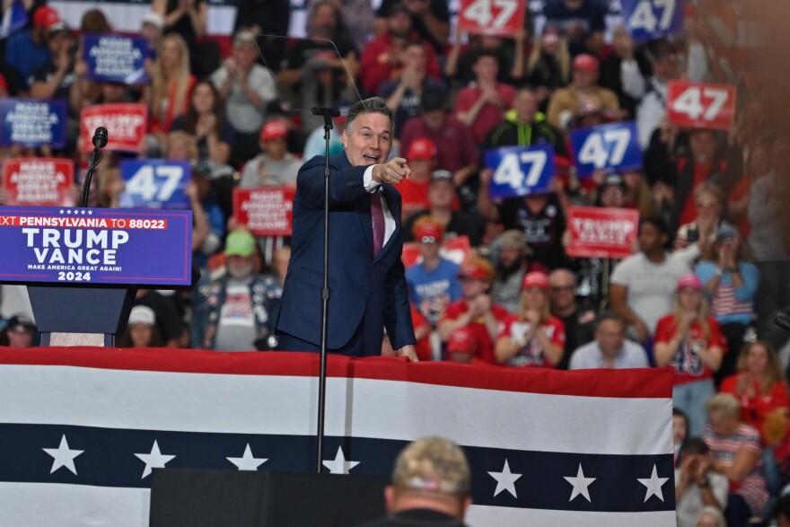 Dave McCormick, the Republican nominee for U.S. Senate in Pennsylvania, greets supporters at the rally for Donald Trump in Scranton on Wednesday.