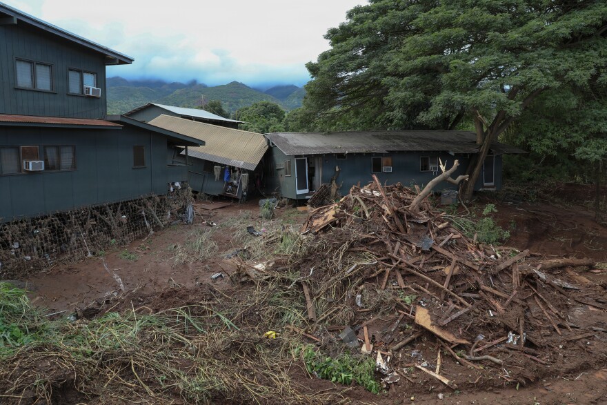 A damaged home sits among flood debris in Waialua, Hawaiʻi, on March 23, 2026.