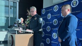 A photo of Lawrence Police Chief Rich Lockhart discussing a cold case involving sex crimes against children that took place in Lawrence in 2000 and 2003. Douglas County District Attorney Dakota Loomis stands to the right. The two men took part in a news conference on Tuesday, December 30, 2025 at the Lawrence Police Department.