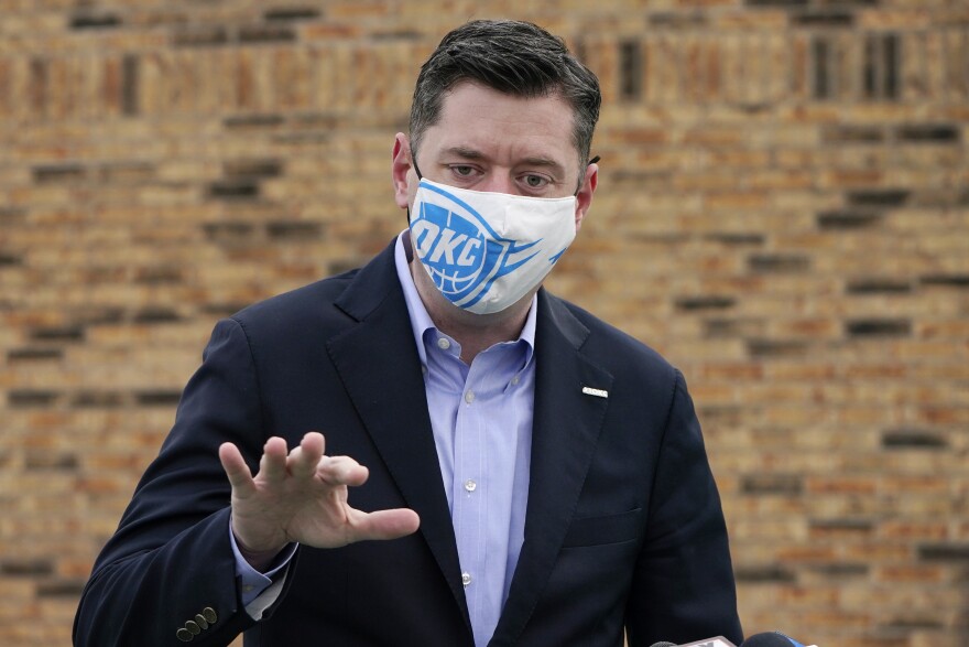 in this Jan. 26, 2021, file photo, Oklahoma City Mayor David Holt talks with the media in Oklahoma City. Holt The mayor of Oklahoma's largest city has publicly received his first dose of the coronavirus vaccine. 