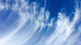 Photograph of cirrus clouds in the sky.
