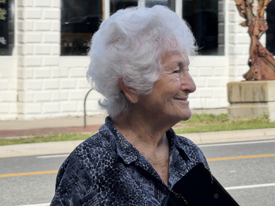 Area residents smile as Gainesville Fire Rescue firefighters push the department’s new engine into the station on Thursday, Sept. 24, 2026. (Genesis Trujillo/WUFT News)