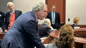 The energy co-chair, Rep. Jonathan Steinberg ,consults with Katie Dykes, the commissioner of energy and environmental protection before a hearing on energy prices and regulation. At left is the Senate co-chair, Norm Needleman.