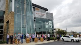 The line to buy New Riff's bonded whiskey Wednesday morning reached from the front doors to the street.