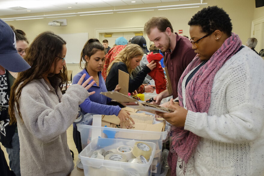 Miami students search for supplies during a marketing class project.