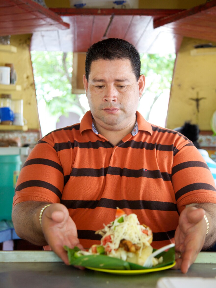 Francisco Javier Gomez Torres serves up to 300 plates of vigorón a day at his kiosk El Gordito in Granada, Nicaragua.