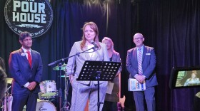 Sen. Jay Chaudhuri, R-Wake, left, and Sen. Vickie Sawyer, R-Iredell, at microphone, held a news conference at the Pour House Music Hall to promote their legislation cracking down on ticket resellers.