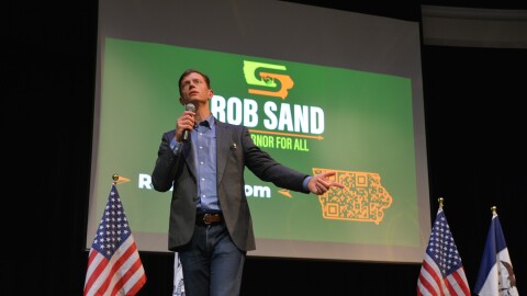 Rob Sand speaks to residents in Prairieview Theatre Arts Center in Waukee. Sand kicked off his 100 Town Hall tour Wednesday night as part of his campaign for governor in 2026.