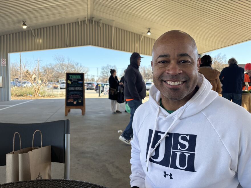 David Lovelady just purchased organic food from Happy Hollow Farm at the Columbia Farmers Market in Missouri on Saturday, Dec. 7, 2024. “I want to make sure that I put good fuel in my body, because I feel it's a temple,” he said.