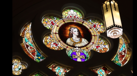 A stained-glass window in the sanctuary of St. John's United Methodist Church, Davenport, which will host a special benefit concert Sunday, June 7 at 3 p.m.