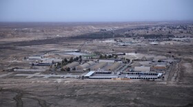 This aerial photo taken from a helicopter shows Ain al-Asad air base in the western Anbar desert, Iraq. (Nasser Nasser/AP)