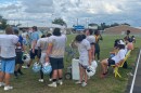 Chiefland High School football team taking a water break midway through practice. (Dylan Pierce/ WUFT News)