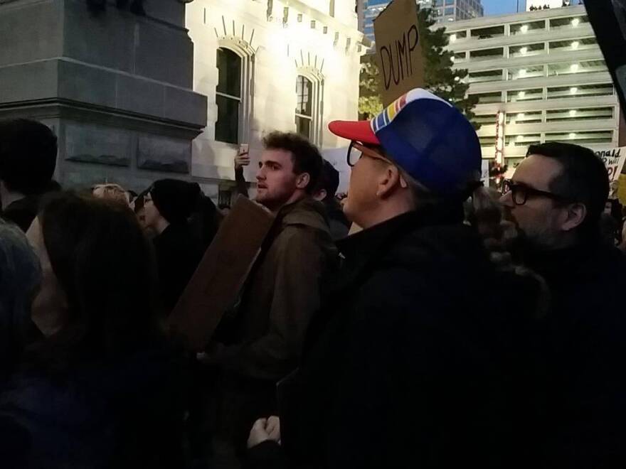 More than 500 protesters gather for an anti-Trump rally on the lawn of the Indiana Statehouse