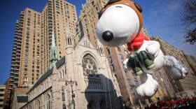 Parade participants guide a Snoopy float at the annual Macy's Thanksgiving Day Parade on Nov. 27, 2008 in New York City. (Yana Paskova/Getty Images)