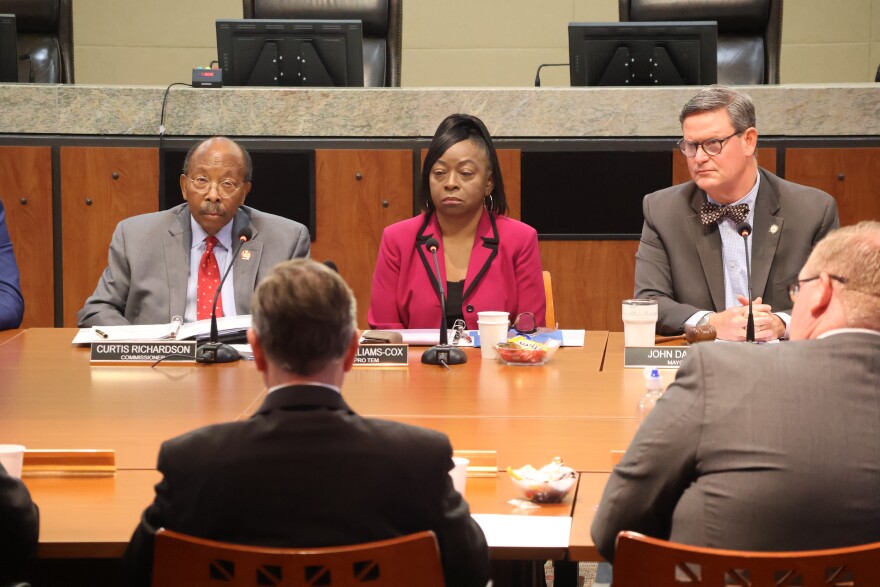 Tallahassee Commissioners Curtis Richardson, Dianne Williams-Cox and Mayor John Dailey watch and listen to Florida State University President Richard McCullough speak during the TMH/FSU presentation on October 1st, 2025.