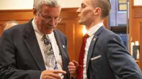 House Majority Leader Rep. Dan Saddler (R-Eagle River) speaks with Minority Leader rep. Calvin Schrage (I-Anchorage) on the last day of the regular session on May 17, 2023. (Lex Treinen/Alaska Public Media)