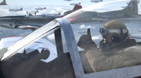 Escorting a squadron of bombers, Andrew "Smokey" Salem (Ne-Yo) signals fellow pilots on the way into combat with German forces in the new film <em>Red Tails</em>, based on the experiences of the famed Tuskegee Airmen fighter group.