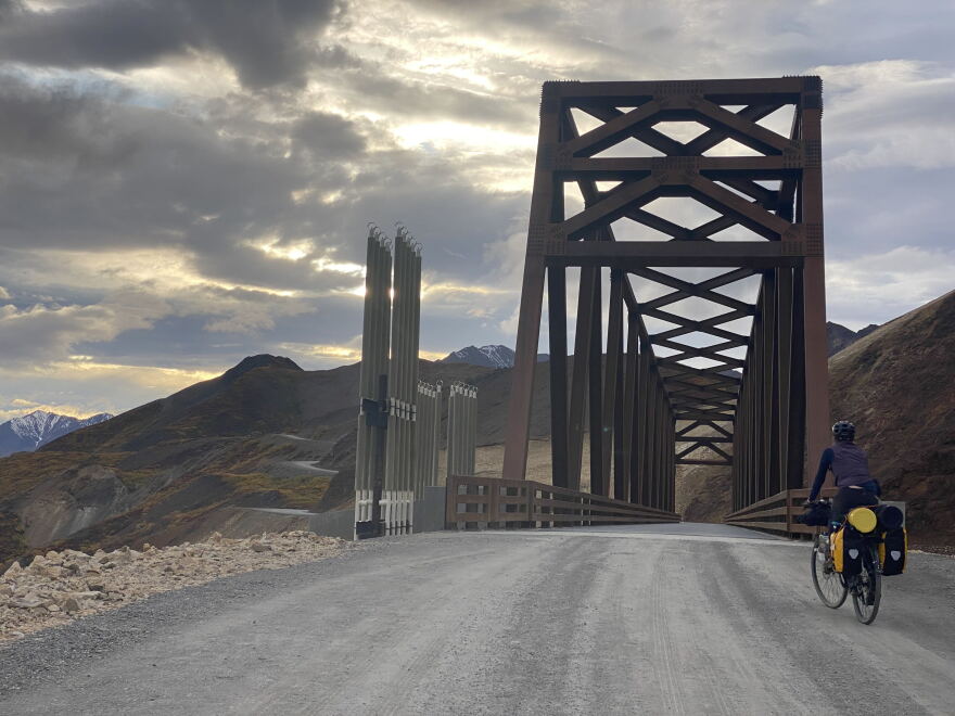 Cherissa Dukelow rides over the Pretty Rocks Bridge on Sept. 7, 2026.