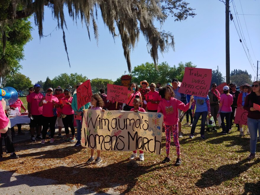 Dozens march in Wimauma, Florida, to celebrate Women's History Month and the contributions of women farmworkers on March 23.