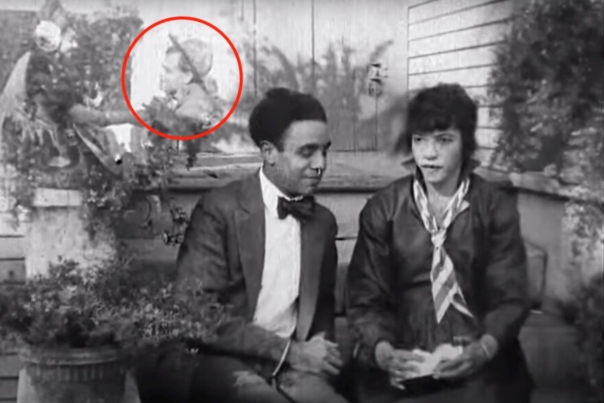 An image from the film “By Right of Birth” (1921), which Caddoo discovered was actually footage from the lost film “The Trooper of Troop K” (1916). Actor Noble Johnson appears in the corner.