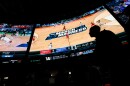  In this March 15, 2018, file photo, people watch coverage of the first round of the NCAA college basketball tournament at the Westgate Las Vegas Superbook sports book in Las Vegas. Nevada casinos have crossed the $1 billion revenue mark for the third consecutive month. Regulators released data Monday, April 30, 2018, showing casinos statewide earned about $1.03 billion from gamblers in March. 