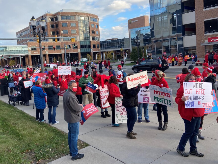 Sparrow caregivers picket outside the main hospital in Lansing to secure a new contract that includes better working conditions. The union contract expired October 30.