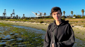 Maria BC standing in front of the port cranes at Middle Harbor Park. 