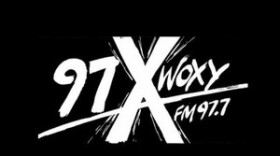 woxy logo white on black font