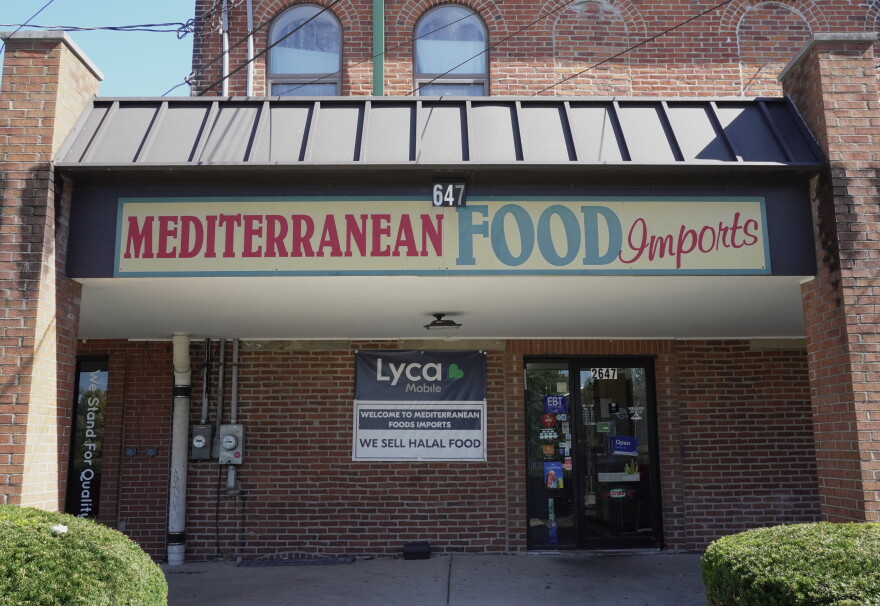 A storefront with the name, 'Mediterranean Food Imports'
