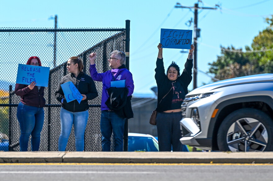 Protesters gathered outside of the county courthouse during Sen. McCormick's press conference.
