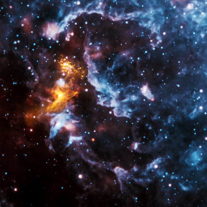 X-rays from Chandra are gold; infrared from WISE in red, green and blue/max