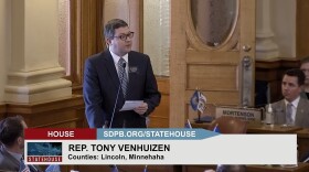 Representative Tony Venhuizen introduces HJR 5004 for House approval. The resolution calls for a constitutional amendment that allows the state to consider work requirements for "able-bodied" people eligible for Medicaid expansion.