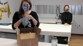 Abbi Houson (left) and Rainy Edwards stay socially distant while working on custom projects.