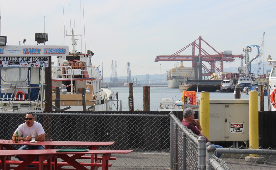 Berth 55 Fish Market and Seafood Deli is in the heart of the Port of Long Beach. Owner Lawrence Maehara says half his customers are port workers, so business is slow.