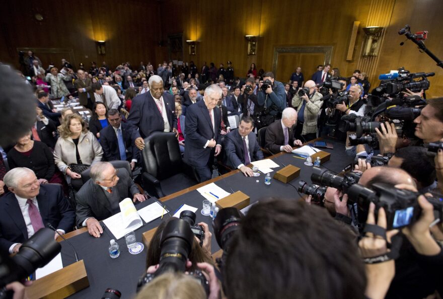 Secretary of State-designate Rex Tillerson, center, accompanied by, from left, former Defense Secretary Robert Gates, former Georgia Sen. San Nunn, Sen. Ted Cruz, R-Texas, and Senate Majority Whip John Cornyn of Texas, takes his seat on Capitol Hill in Washington, Wednesday, Jan. 11, 2017, prior to testifying at his confirmation hearing before the Senate Foreign Relations Committee. (Steve Helber/AP)