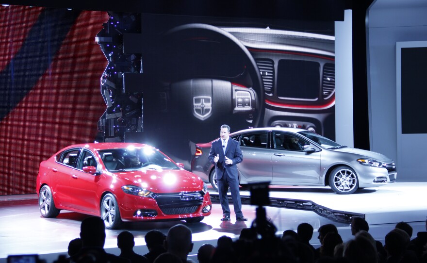 Reed Bigland, Head of Dodge Brand reveals the new 2013 Dodge Dart at the Detroit Auto Show.