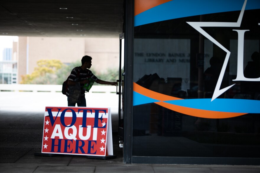 A voter enters a polling location at the Lyndon B. Johnson Presidential Library and Museum during the last day of early voting in Austin, Texas on Nov. 7, 2022. Alyssa Olvera for KUT