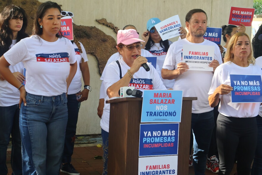 Martha Cabrera (speaker at podium), a longtime resident of the district and a former registered Republican voter, said she changed her voter registration to Non-Party Affiliated after feeling deceived by U.S. Rep. Maria Elvira Salazar’s promises. She spoke at a rally on Thursday, October 29, 2026, in Little Havana.