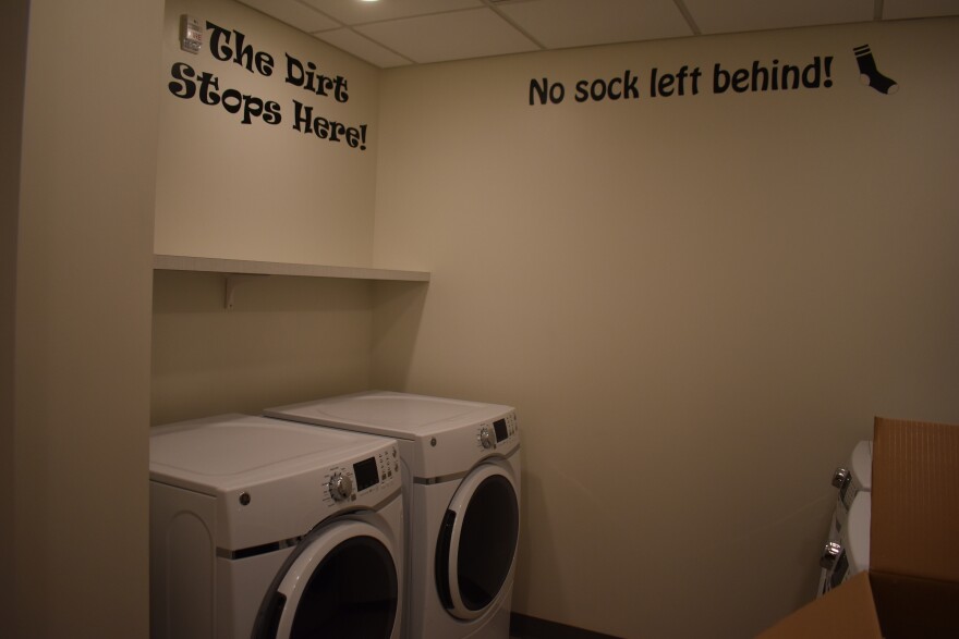 Each floor features a community living space, laundry facilities, breastmilk storage areas and hallways lined with work by local artists.