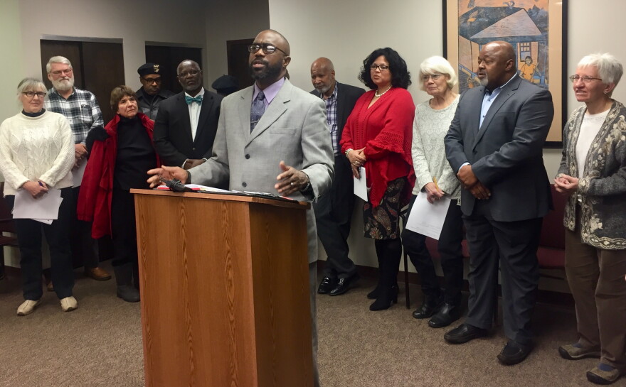 Rockney Carter, of the Clergy Community Coalition, speaks to reporters at a Good Samaritan Hospital closure-related press conference Thursday.